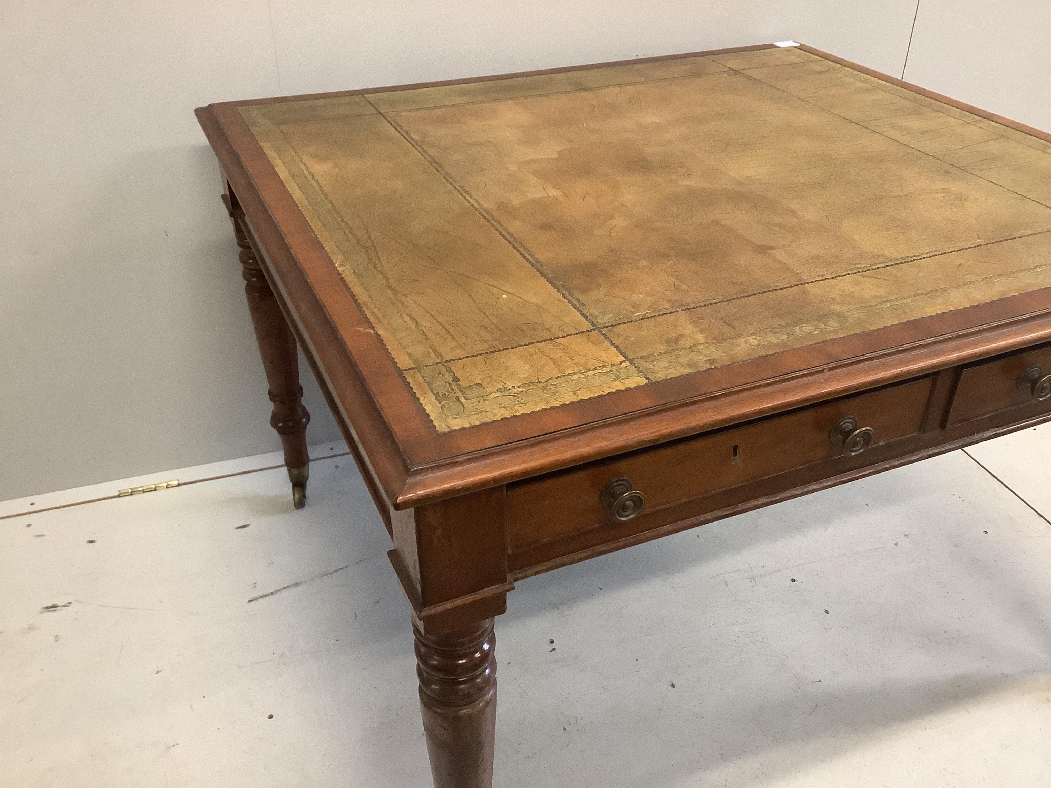 A Victorian mahogany partner's writing table, width 110cm, depth 100cm, height 72cm. Condition - fair